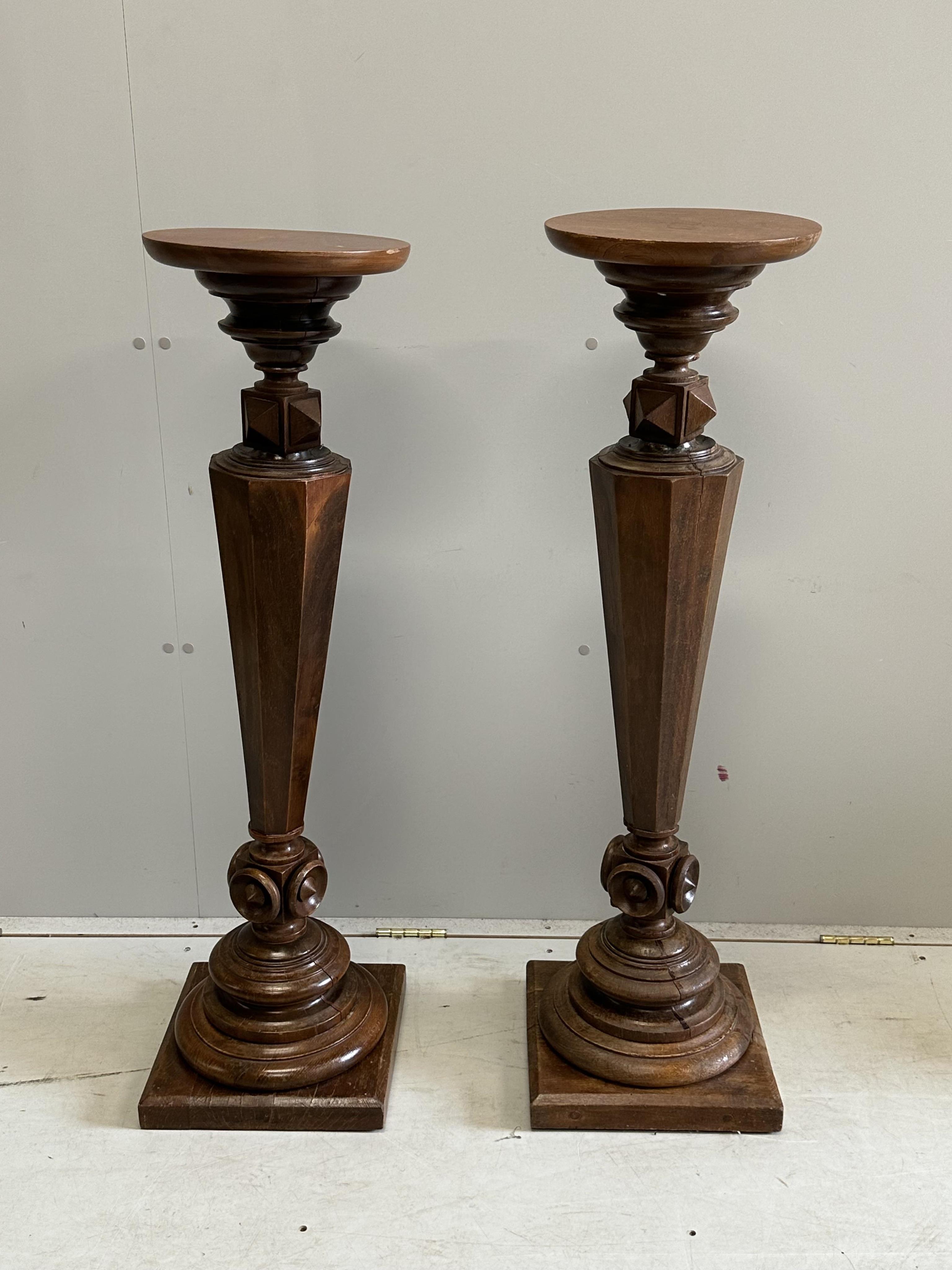 A pair of Victorian and later mahogany pedestals, height 107cm. Condition - fair